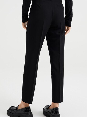WE Fashion Slim fit Trousers with creases in Black