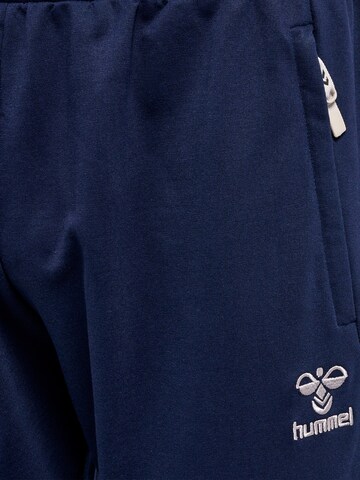 Effilé Pantalon de sport 'Move Grid' Hummel en bleu