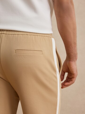 DAN FOX APPAREL Tapered Trousers 'Sven' in Beige