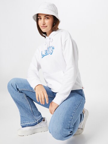 LEVI'S ® Collegepaita 'Graphic Standard Hoodie' värissä valkoinen