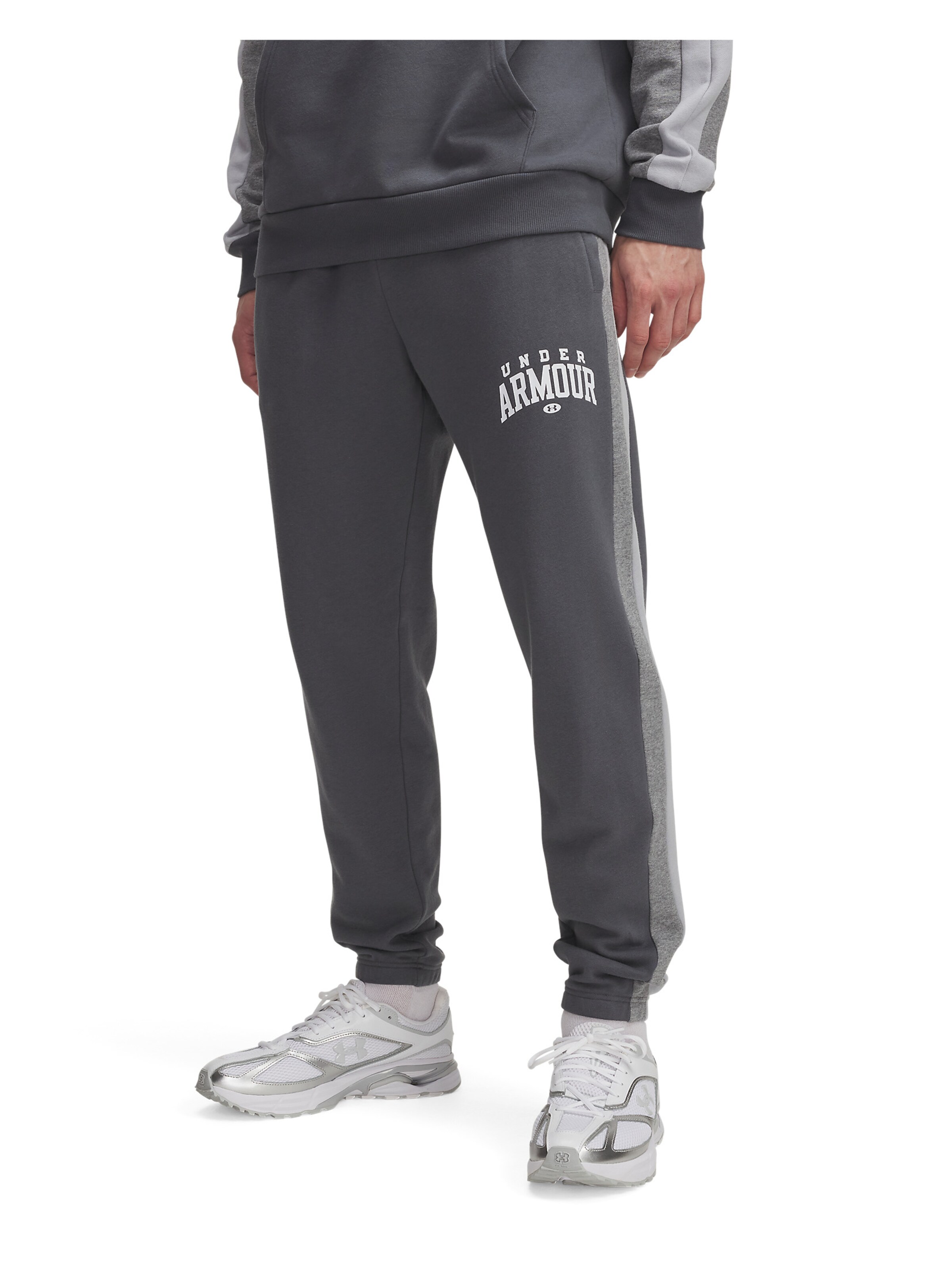 UNDER ARMOUR Tapered Sports trousers in Grey