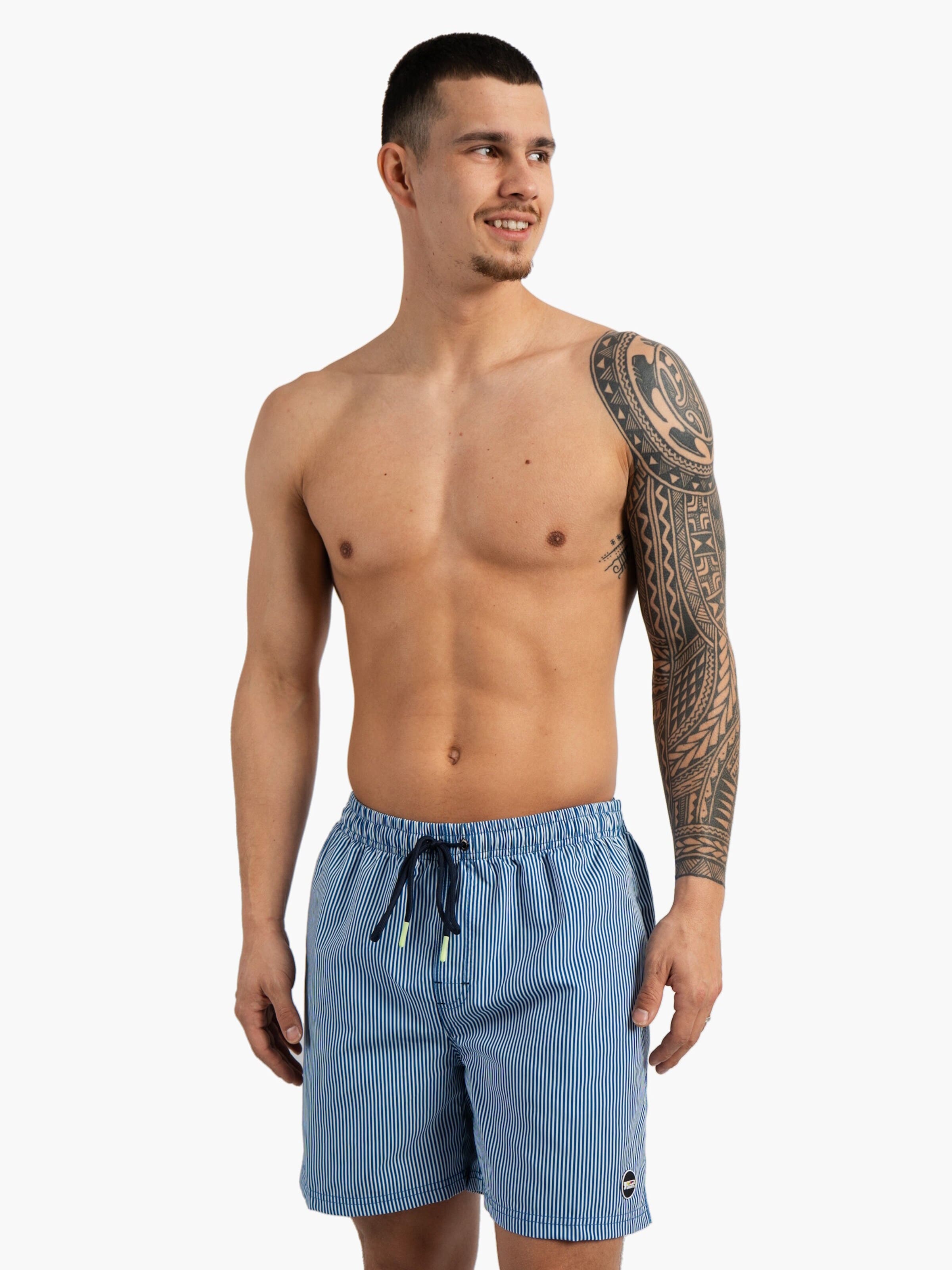 Happy Shorts Board Shorts in Blue: front