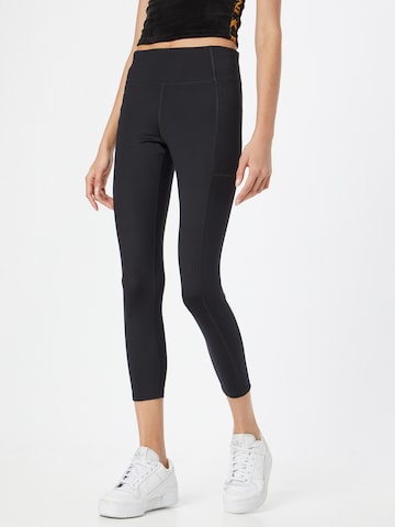 Girlfriend Collective Skinny Workout Pants in Black: front