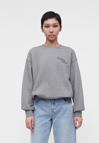 Calvin Klein Jeans Bluzka sportowa w kolorze szary: przód