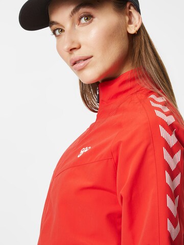 Veste de sport Hummel en rouge