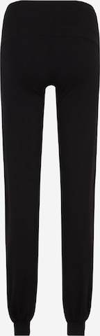 Effilé Pantalon de sport Casall en noir