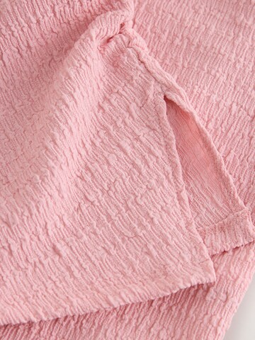 Set Next en rose