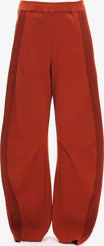 yoligex Lużny krój Spodnie 'YOLIGEX Lockere Jogpants Orange-Rot mit gerafften Seitenpaneelen' w kolorze pomarańczowy: przód