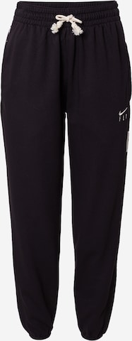 NIKE Tapered Workout Pants in Black: front