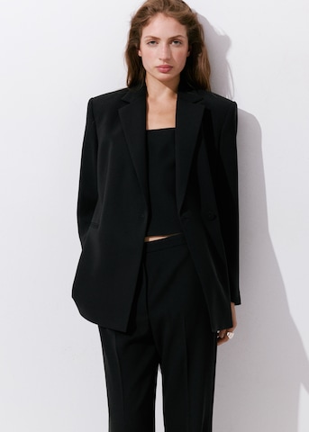 MANGO Boot cut Trousers with creases 'IGUANA' in Black