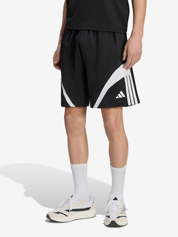 ADIDAS SPORTSWEAR Loosefit Urheiluhousut 'Tiro' värissä musta: etupuoli