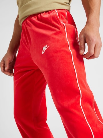 Nike Sportswear Дънки Tapered Leg Панталон в червено