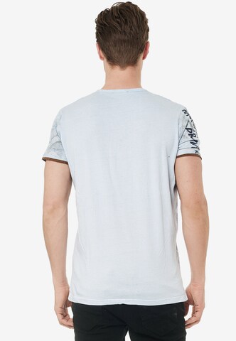 Rusty Neal T-Shirt mit lässigem All Over Print in Weiß