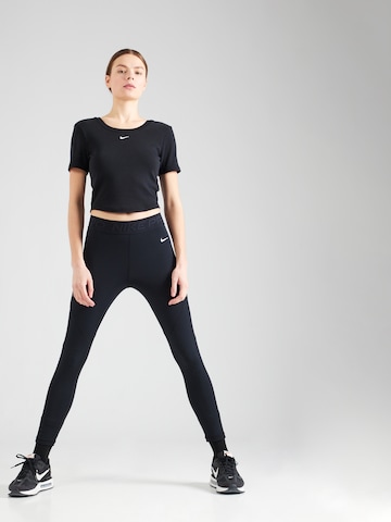 Skinny Pantaloni sport 'NOVELTY' de la NIKE pe negru