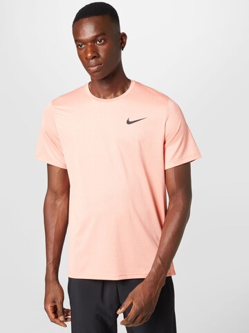 T-Shirt fonctionnel 'Pro' NIKE en orange : devant