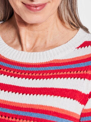 Goldner Trui in Rood