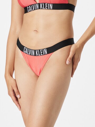 Calvin Klein Swimwear Regular Bikinihousut 'Intense Power' värissä oranssi: edessä