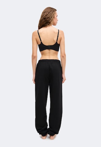 Tapered Pantaloni di GUESS JEANS in nero