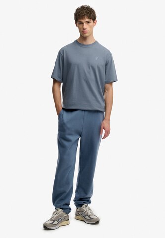 Superdry Tapered Broek in Blauw