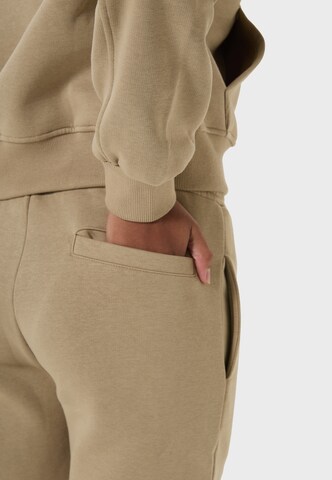 Tom Barron Joggingpak in Bruin