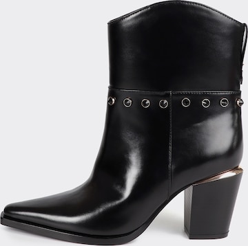 juoda Lola Casademunt Kulkšnis dengiantys batai: priekis