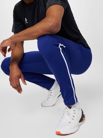 Skinny Pantalon de sport UNDER ARMOUR en bleu