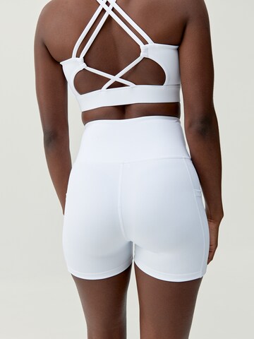 Skinny Pantalon de sport 'Cira' Born Living Yoga en blanc