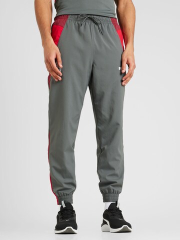 Effilé Pantalon de sport PUMA en gris : devant