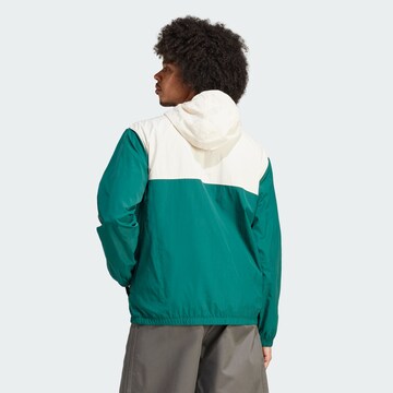 ADIDAS ORIGINALS Välikausitakki värissä vihreä