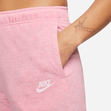 Nike Sportswear Tapered Pants in Pink