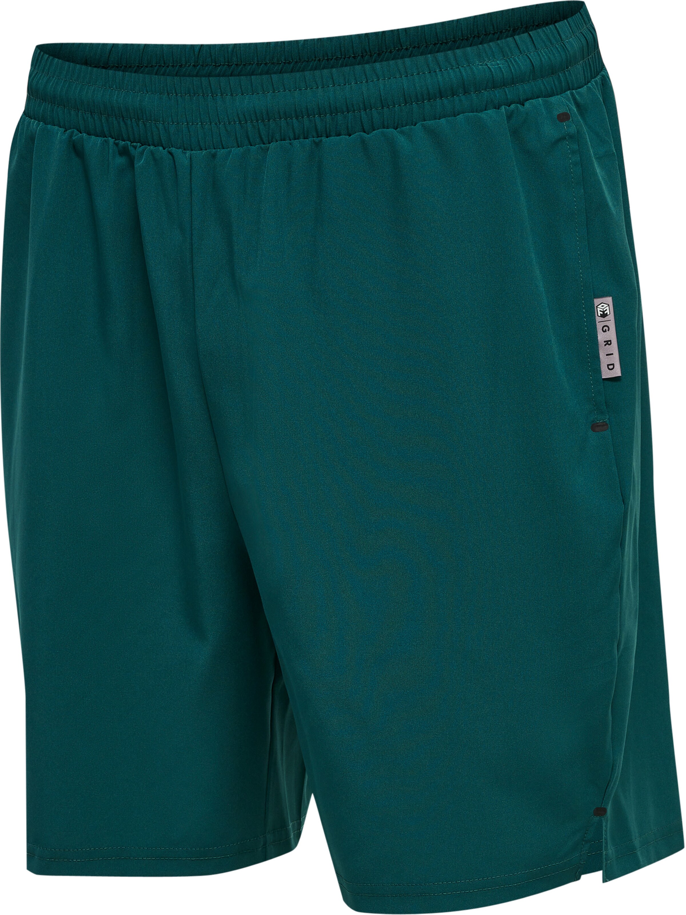 Hummel Regular Workout Pants 'Move Grid' in Green