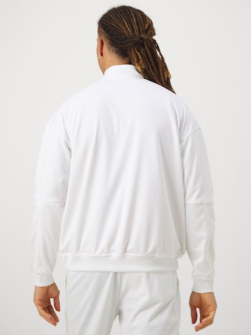 Veste de survêtement 'Heritage' NIKE en blanc
