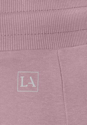 LASCANA ACTIVE Slimfit Παντελόνι φόρμας σε ροζ