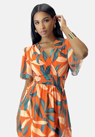 Elara Jurk in Oranje