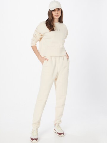 Casall Tapered Sportbroek in Beige