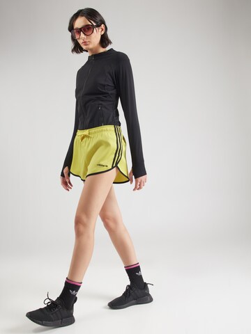 ADIDAS ORIGINALS Loosefit Nadrág 'SPRINTER' - sárga