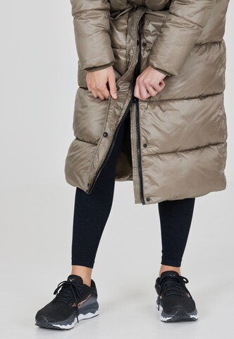 Athlecia Raincoat 'Elly' in Green