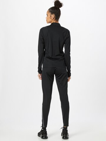 NIKE Sportsdragt i sort