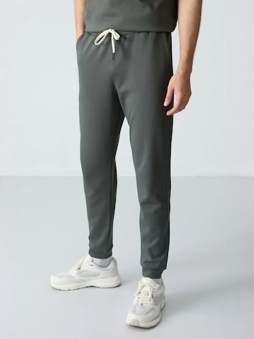 Tommy Life Jogginganzug in Grün