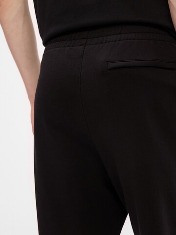 Calvin Klein Jeans Zwężany krój Spodnie w kolorze czarny