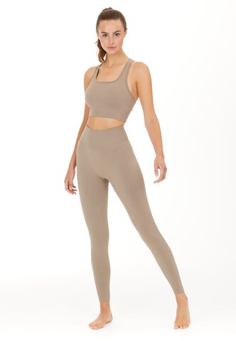 Athlecia Slim fit Workout Pants 'Aideny' in Beige