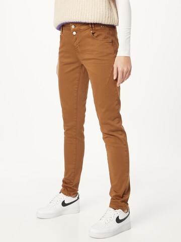 Coupe slim Pantalon Cartoon en marron : devant