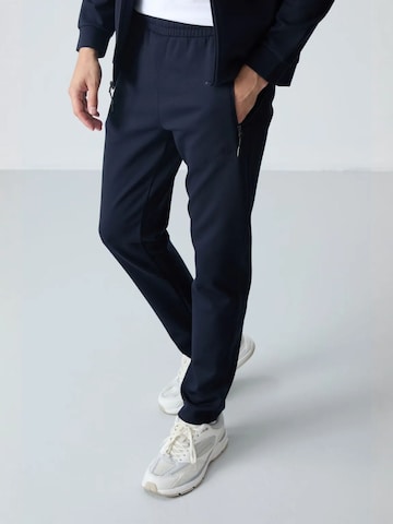 Tommy Life Trainingspak in Blauw