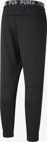 PUMA - Tapered Calças de desporto em preto