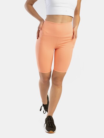 Spyder Skinny Sportbroek in Oranje: voorkant