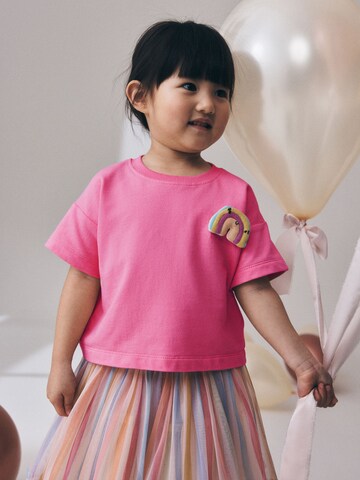 Set Next en rose