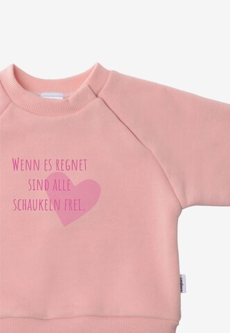 LILIPUT Sweatshirt 'Wenn es regnet sind alle Schaukeln frei' in Pink