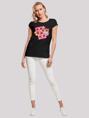 T-shirt 'Christmas Retro Song Tapes Pink' F4NT4STIC en noir