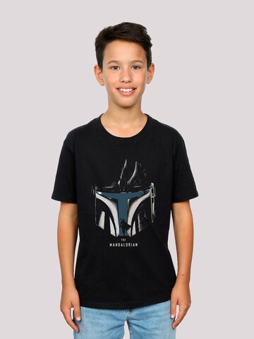 F4NT4STIC Shirt 'Star Wars The Mandalorian Helmet Silhouette' in Zwart: voorkant