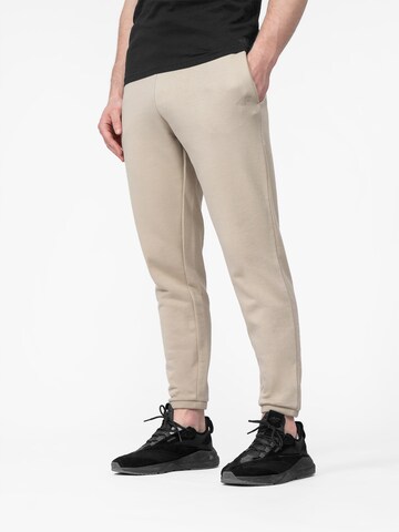 4F Loose fit Sports trousers in Beige: front